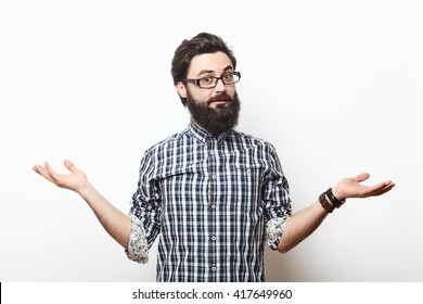 Bearded hipster young man wearing glasses doubting with his hands isolated on white background