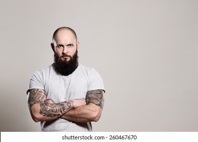 Bearded Man With Crossed Arms - Studio Shot