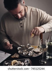 Bearded Man Eating Oysters 