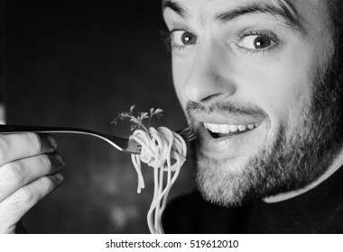 Bearded Man Eating Spaghetti