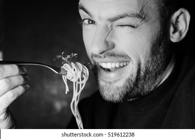 Bearded Man Eating Spaghetti