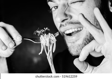 Bearded Man Eating Spaghetti