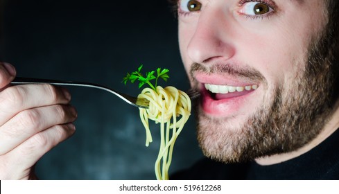 Bearded Man Eating Spaghetti