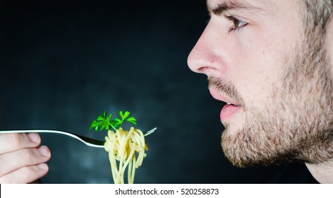 Bearded Man Eating Spaghetti