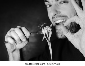 Bearded Man Eating Spaghetti