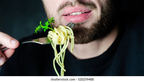 Bearded Man Eating Spaghetti