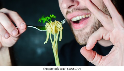 Bearded Man Eating Spaghetti