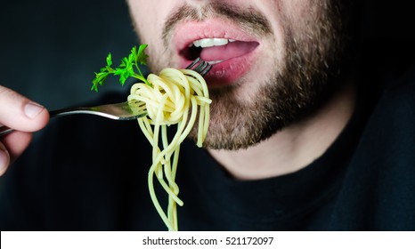 Bearded Man Eating Spaghetti