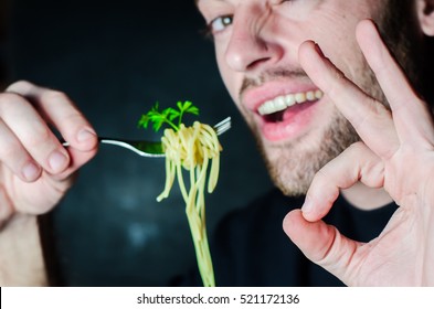 Bearded Man Eating Spaghetti