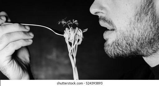 Bearded Man Eating Spaghetti