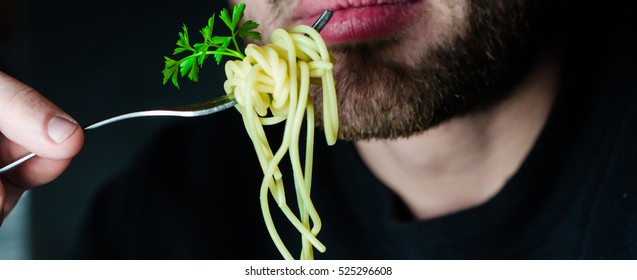 Bearded Man Eating Spaghetti