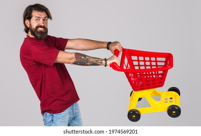 Bearded Man With Empty Shopping Cart. Male On Shopping. Buying Spree. Supermarket.