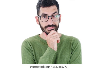 Bearded man with an expression of discontent on his face. Young man wearing casual clothes skeptic and nervous, disapproving expression on face, negative person. Isolated on white background - Shutterstock ID 2187881771