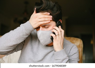 Bearded Man Got A Virus And Using A Medical Mask. Calling To Emergency.