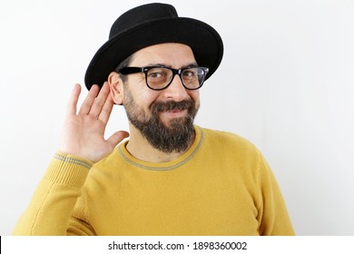 bearded-man-hat-eyeglasses-smiling-260nw