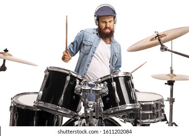 Bearded man with headphones playing a drum set isolated on white background - Powered by Shutterstock