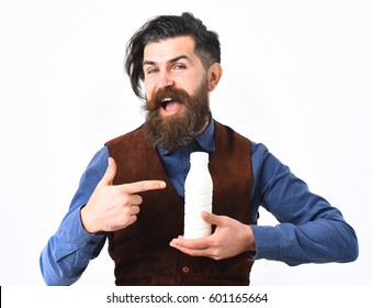 Bearded Man, Long Beard, Brutal Caucasian Hipster With Moustache Holding Bottle Of Kefir Or Yoghurt With Happy Face Isolated On White Background