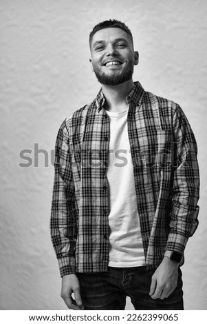 Similar – Image, Stock Photo young guy smiles and touches hair