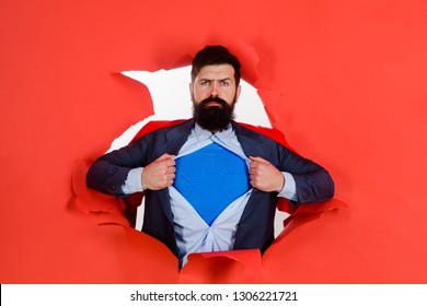 Bearded Man Looking Through Paper. Through Paper. Super Businessmen In Red Cape Showing Blue Shirt. Save The World. Superhero. Red Superman Cape. Safety Hero. Symbol S. Business Growth. Super Power.