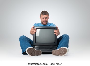 Bearded Man With A Old TV