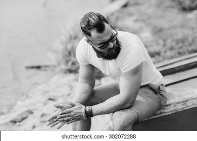 Bearded Man On The Beach