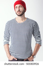 Bearded Man With Sailor Striped Shirt And Red Wool Cap