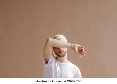 Bearded Man In A White Tee