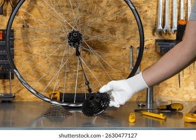 Bearded mechanic gesturing with wheel