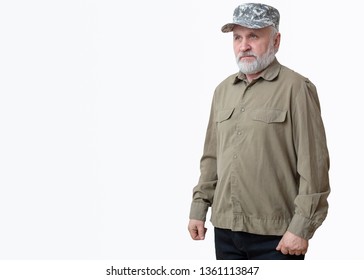 A Bearded Senior Man In A Military Shirt