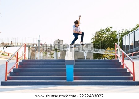 Similar – Image, Stock Photo Young bearded skater performing trick in skatepark