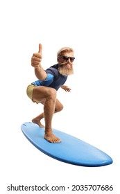 Bearded young man surfing and showing thumbs up isolated on white background