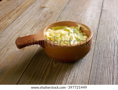 Bearnaise sauce  -  sauce made of clarified butter emulsified in egg yolks.