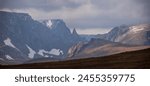 Beartooth Pass mountain panorama with clouds and dramatic lighting