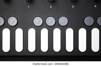 Beat Machine For Electronic Music Producer. Professional Drum Machine With Push Buttons In Flat Lay