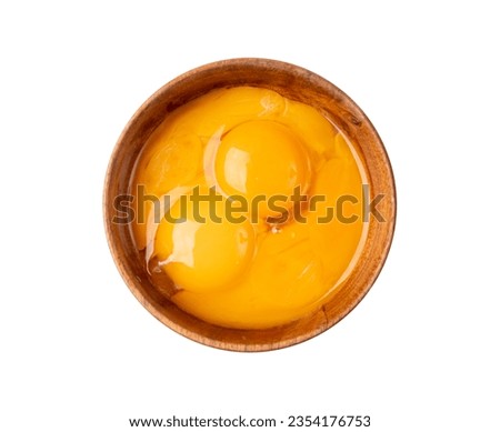 Beaten Egg Yolks in Bowl, Fresh Chicken Eggs for Cooking Recipe, Mixed Organic Yolks in Wooden Bowl