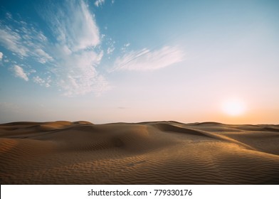 A Beatiful Desert Landscape With Sky. Sand Dunes At Sunset