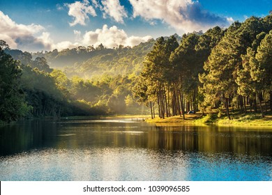 Beatiful nature lake and forest , Pang oung lake and pine forest in Mae Hong Son , Thailand , nature landscape of Thailand . Pang oung is popular travel destination in Thailand