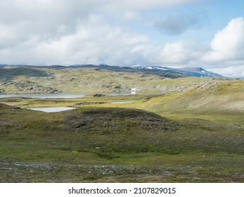 Beatiful Northern Artic Landscape, Tundra In Swedish Lapland With Blue Duottar Lake, Green Hills And Mountains At Padjelantaleden Hiking Trail. Summer Day, Blue Sky, White Clouds