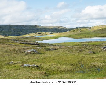 Beatiful Northern Artic Landscape, Tundra In Swedish Lapland With Blue Duottar Lake, Green Hills And Mountains At Padjelantaleden Hiking Trail. Summer Day, Blue Sky, White Clouds