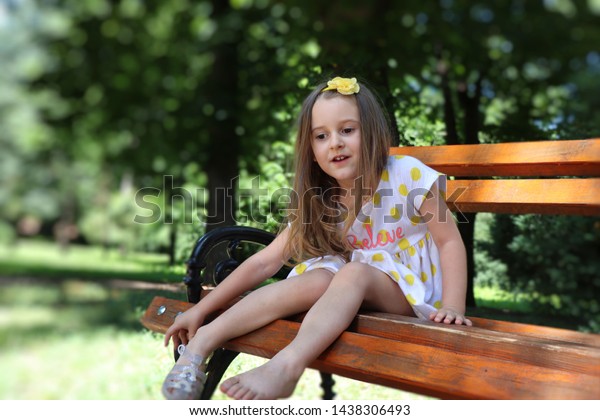 Beatifull Little Girl Sitting On Bench Stock Photo 1438306493 ...