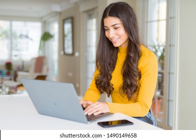 Beauitul Young Woman Working Using Computer Laptop Concentrated And Smiling