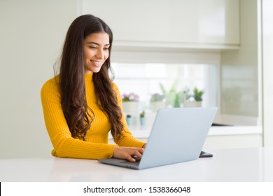 Beauitul Young Woman Working Using Computer Laptop Concentrated And Smiling