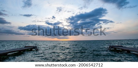 beautful  sunset with dramatic clouds on the sea