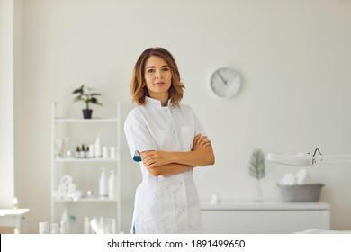 Beautician in the cosmetology office. Cosmetologist doctor dermatologist in a beauty clinic. Facial skin treatment. Beauty treatments. - Shutterstock ID 1891499650