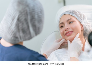 A beautician doing beauty treatment for young woman laying down and relaxing in a beauty clinic ,concept for beauty business advertising