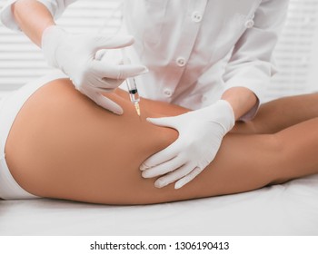 Beautician Doing Injection Into Female Buttocks, Body Mesotherapy
