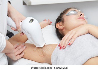 Beautician Giving Epilation Laser Treatment To Woman On underarm - Shutterstock ID 560524228