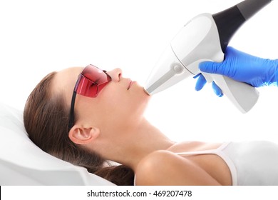 Beautician, Laser Hair Removal. Cosmetic Clinic, A Woman During Laser Hair Removal Facial