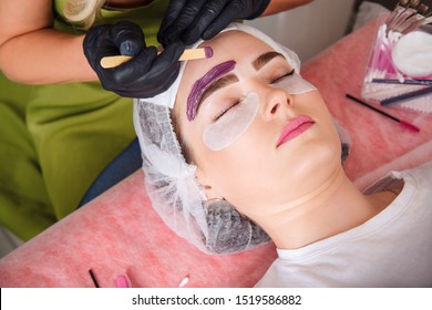 Beautician Makes Depilation With Hot Wax Eyebrow Correction