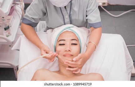 Beautician Perform Beauty Treatment On Woman Face. Blackhead Suction